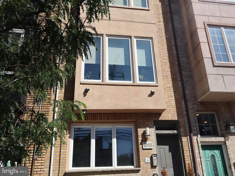 1815 Bainbridge Street, Unit 2 Philadelphia, PA 19146 - Photo 2 of 9 a building view with a outdoor space