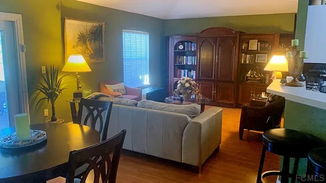 a bed room with a bed and a lamp