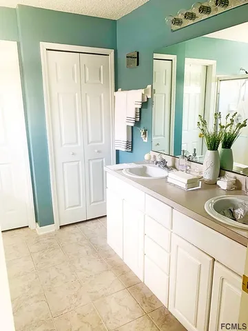 a bathroom with a sink and a toilet
