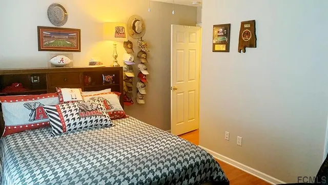 a view of a chairs and table in backyard of the house