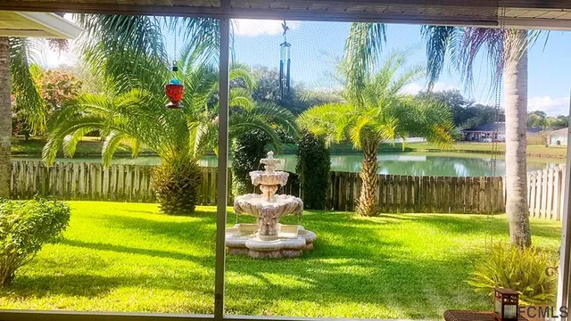 a view of a backyard with a garden