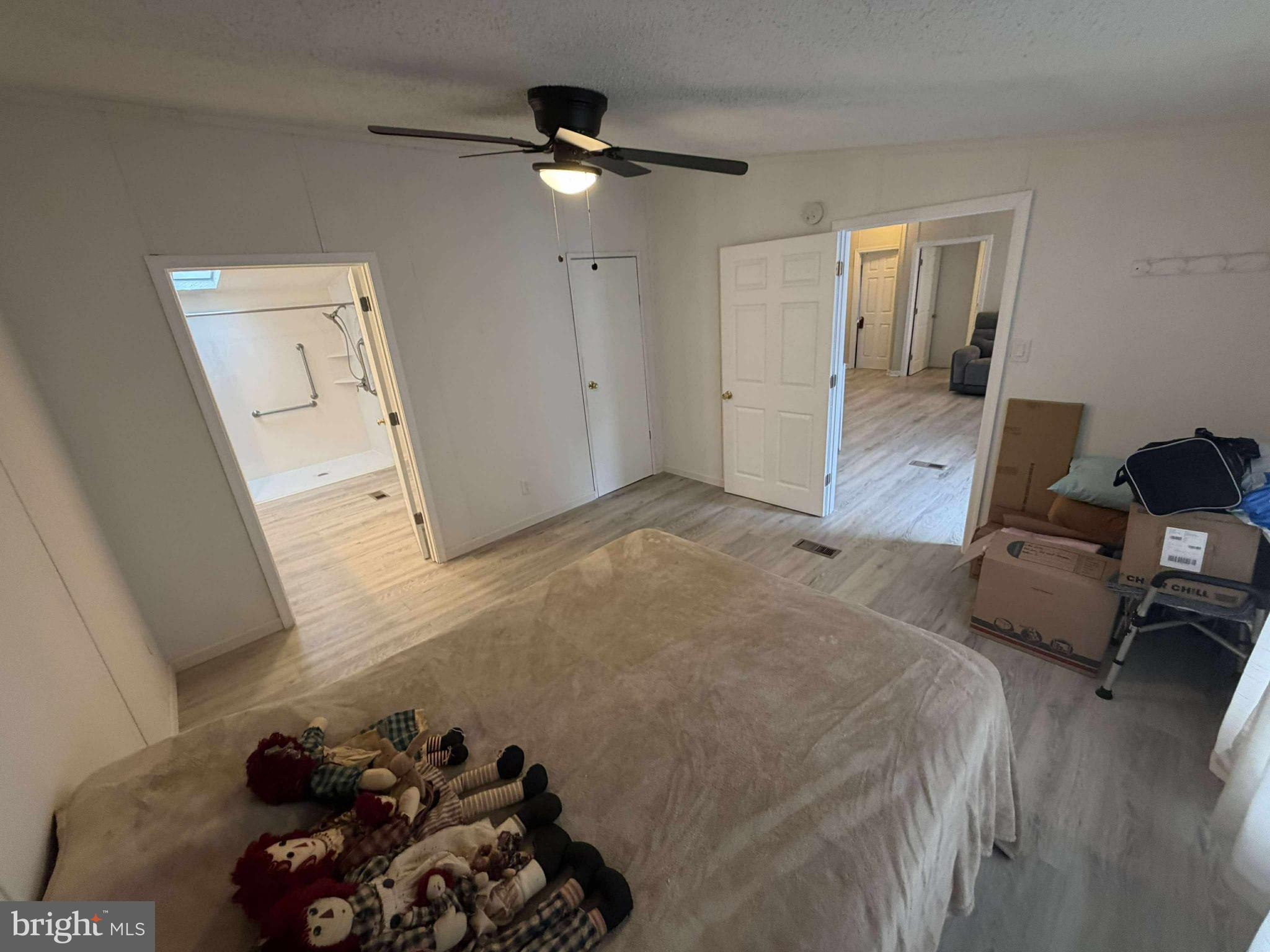 227 Forest Green Road Aberdeen, MD 21001 - Photo 13 of 22 a bed room with a bed and a couch