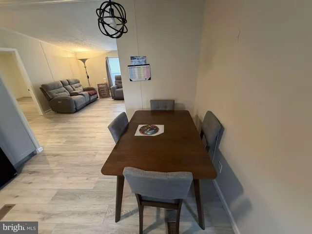 a view of workspace filled with furniture