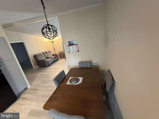 a view of living room with furniture and rug