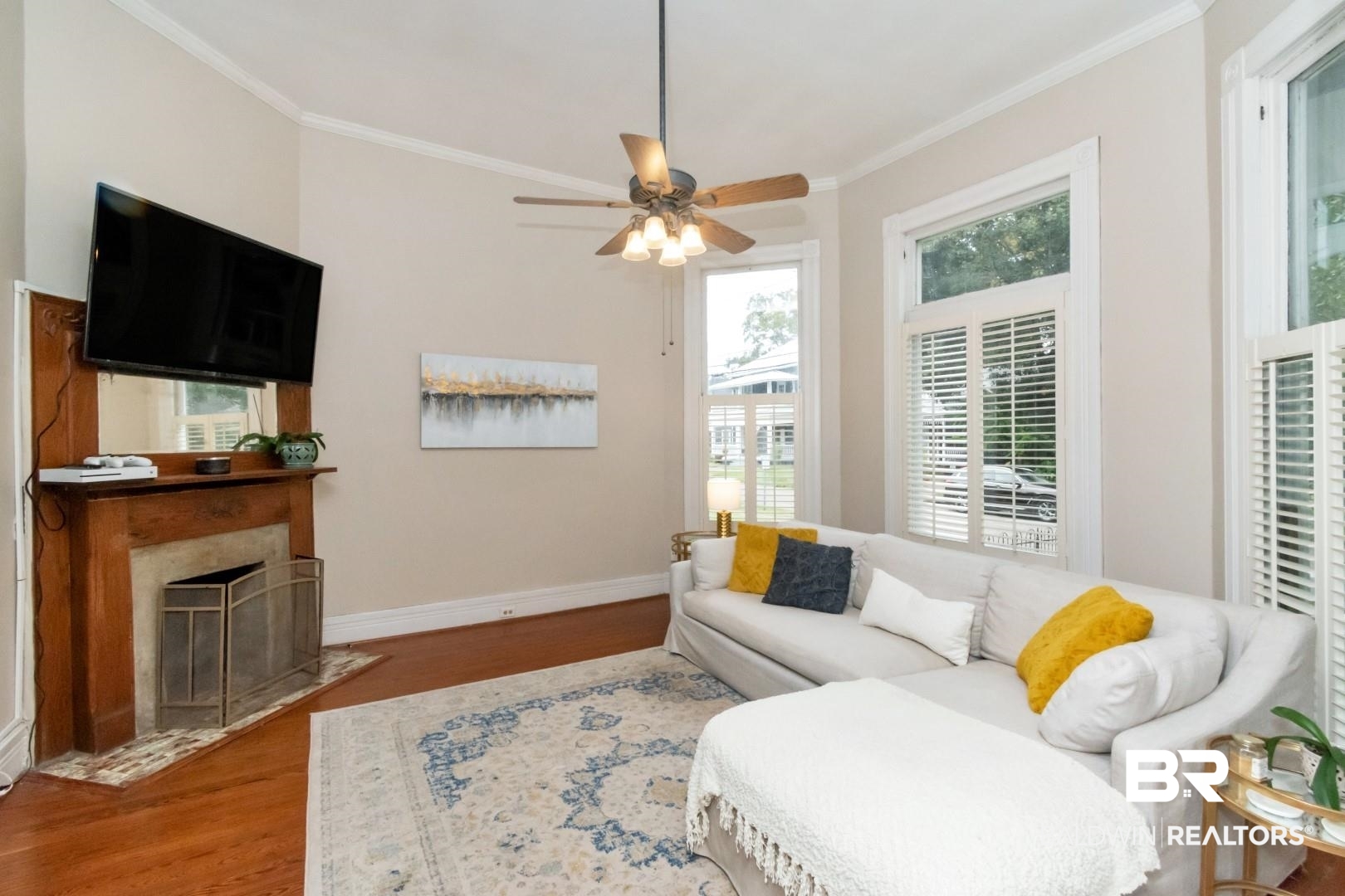 1305 Brown Street Mobile, AL 36604 - Photo 3 of 37 Living room featuring ceiling fan, ornamental molding, and hardwood / wood-style floors
