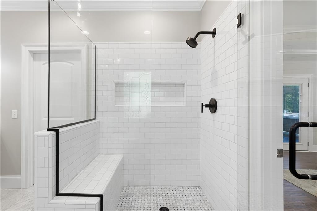 310 Gaines Road Southeast Dalton, GA 30721 - Photo 30 of 53 a bathroom with a shower