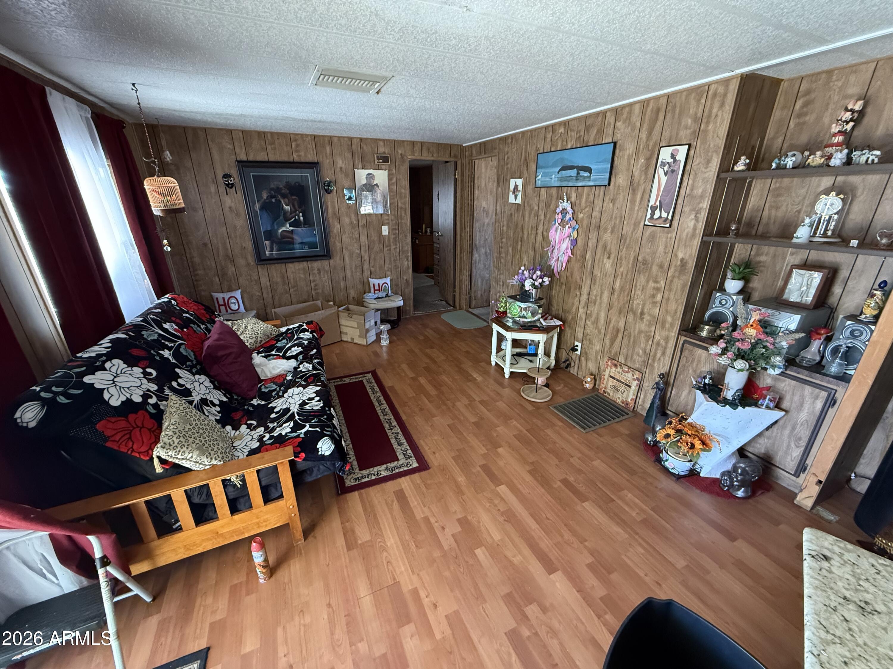 9501 East Broadway Road, Unit 252 Mesa, AZ 85208 - Photo 18 of 31 a living room with furniture and a couch