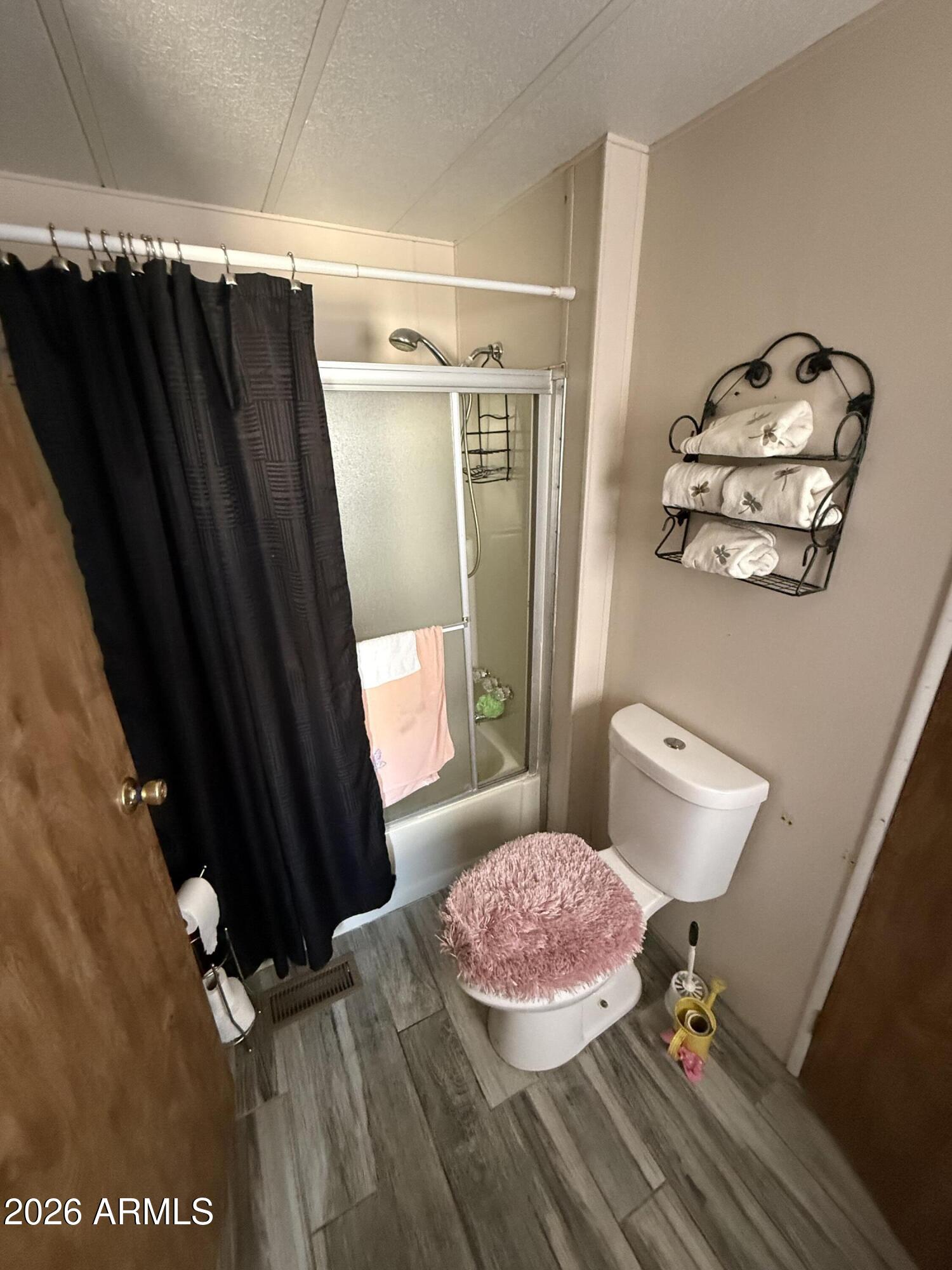 9501 East Broadway Road, Unit 252 Mesa, AZ 85208 - Photo 21 of 31 a bathroom with a sink and a mirror