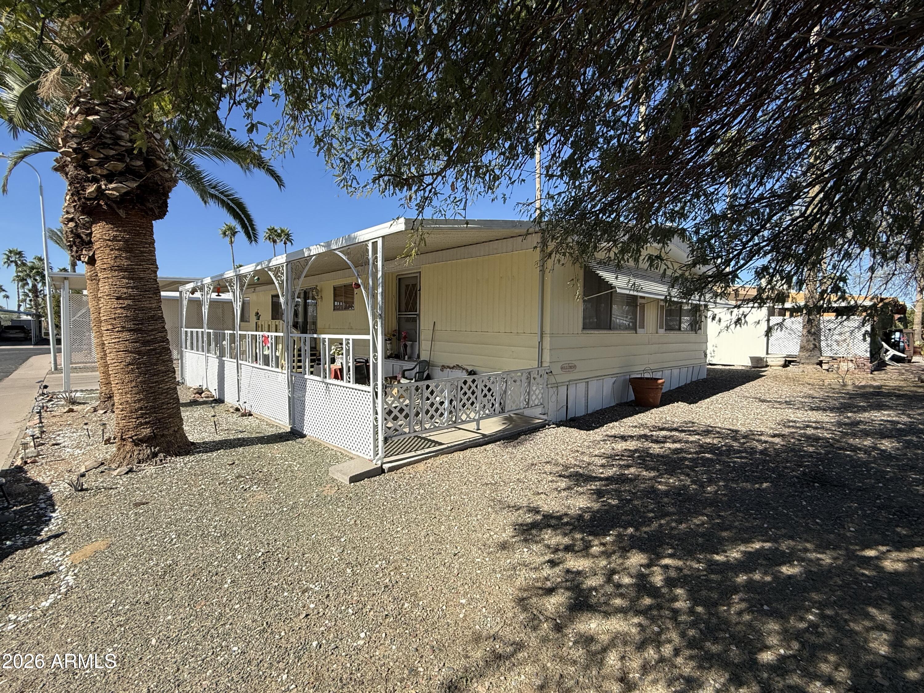 9501 East Broadway Road, Unit 252 Mesa, AZ 85208 - Photo 7 of 31 a view of a house with a snow in the yard