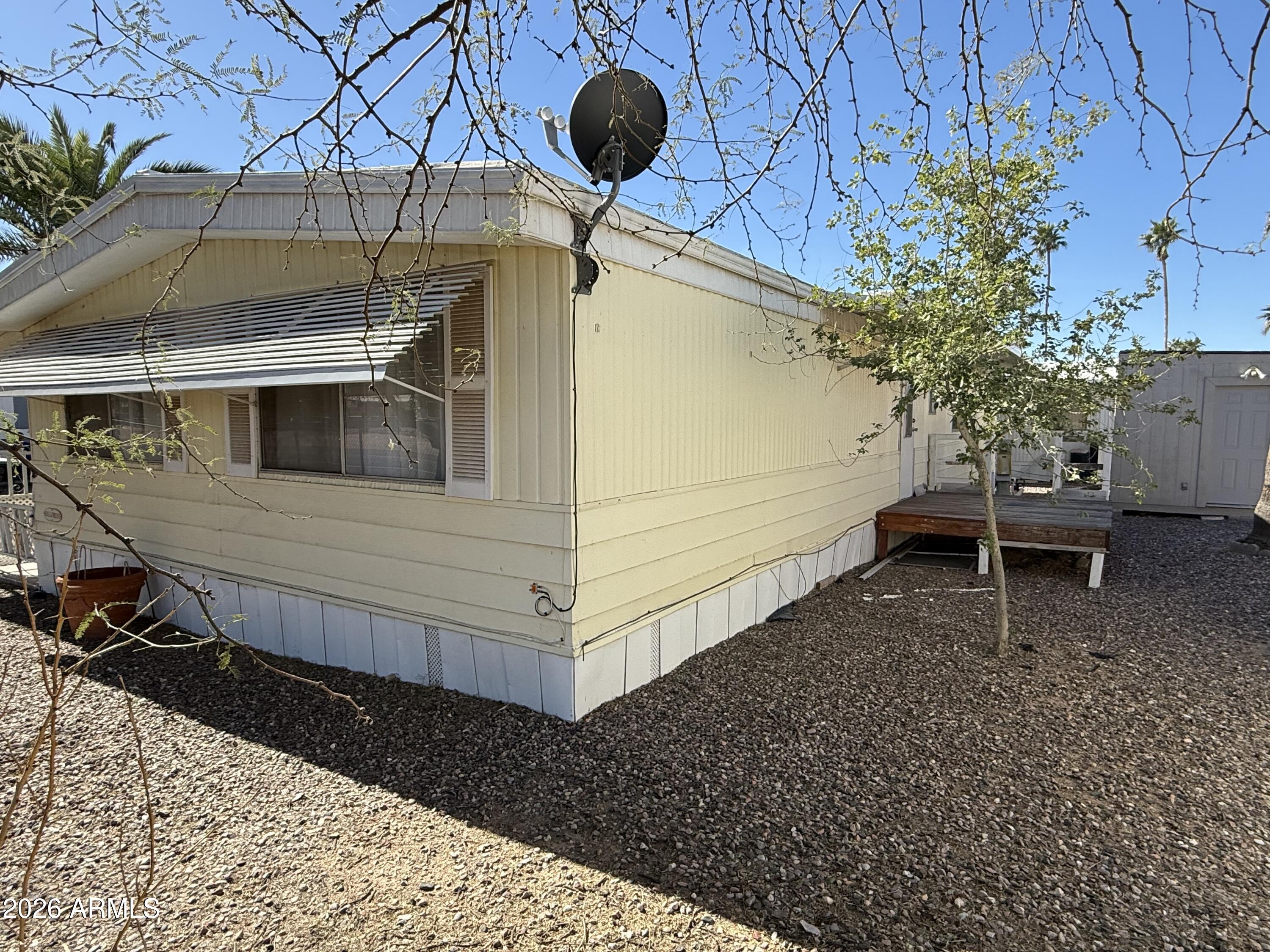 9501 East Broadway Road, Unit 252 Mesa, AZ 85208 - Photo 8 of 31 a view of a backyard of a house