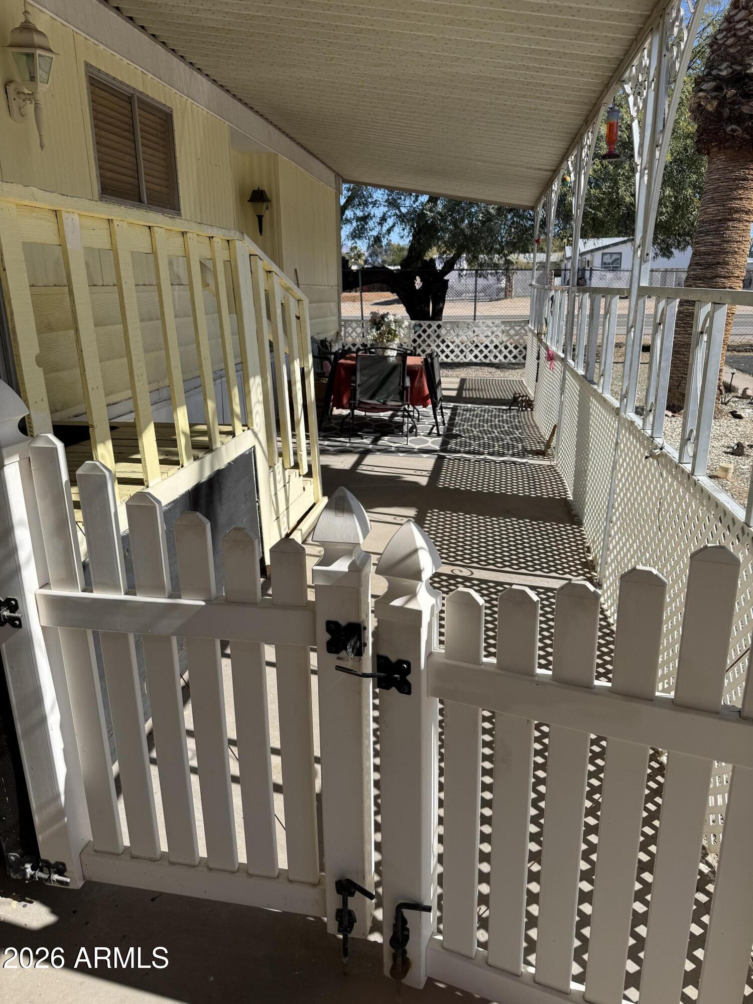 9501 East Broadway Road, Unit 252 Mesa, AZ 85208 - Photo 9 of 31 a view of roof deck with patio