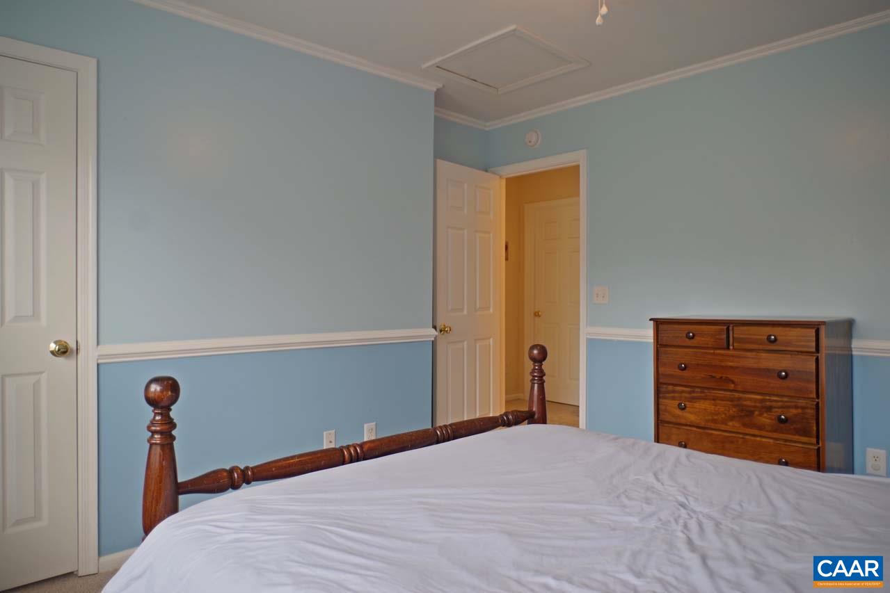 288 Oak View Road Barboursville, VA 22923 - Photo 42 of 47 a bedroom with a bed and cabinets