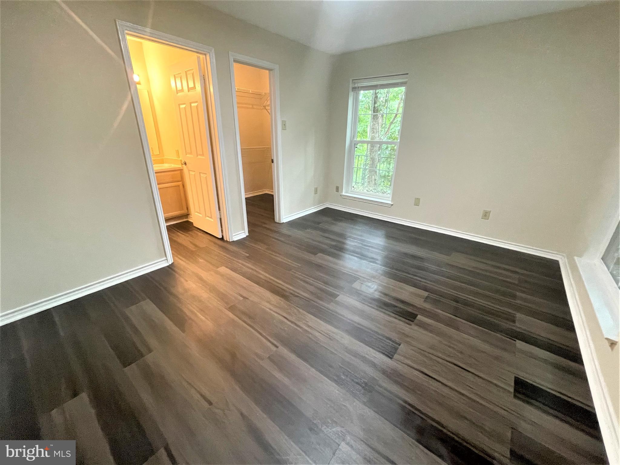 1505 Lincoln Way, Unit 101 McLean, VA 22102 - Photo 19 of 43 Master bedroom w walk-in closet & double windows