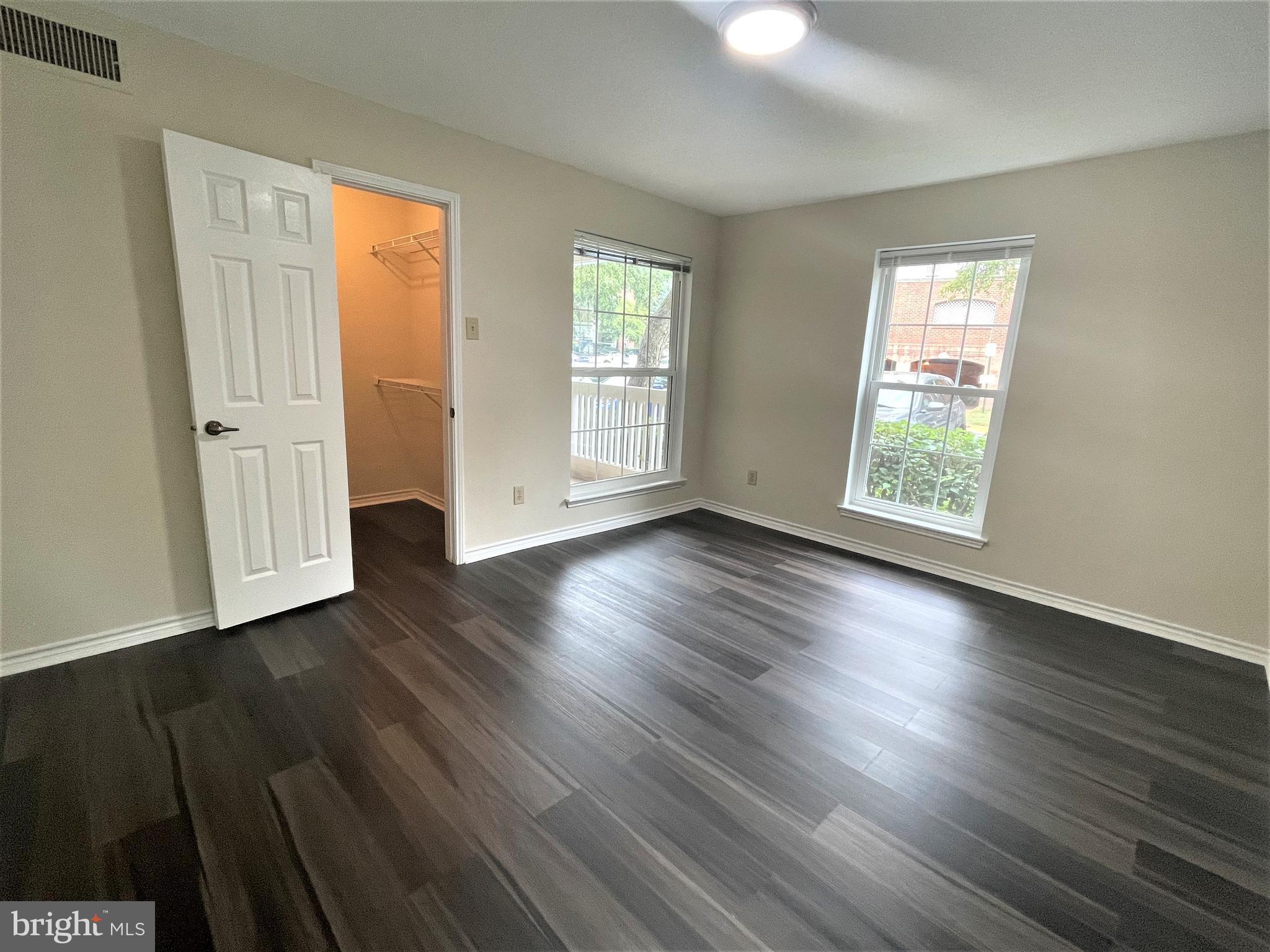 1505 Lincoln Way, Unit 101 McLean, VA 22102 - Photo 23 of 43 2nd bedroom with 3 windows & walk-in closet