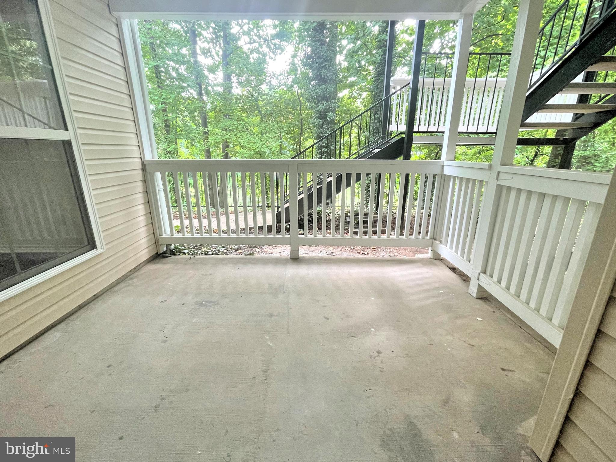 1505 Lincoln Way, Unit 101 McLean, VA 22102 - Photo 29 of 43 Back balcony facing trees