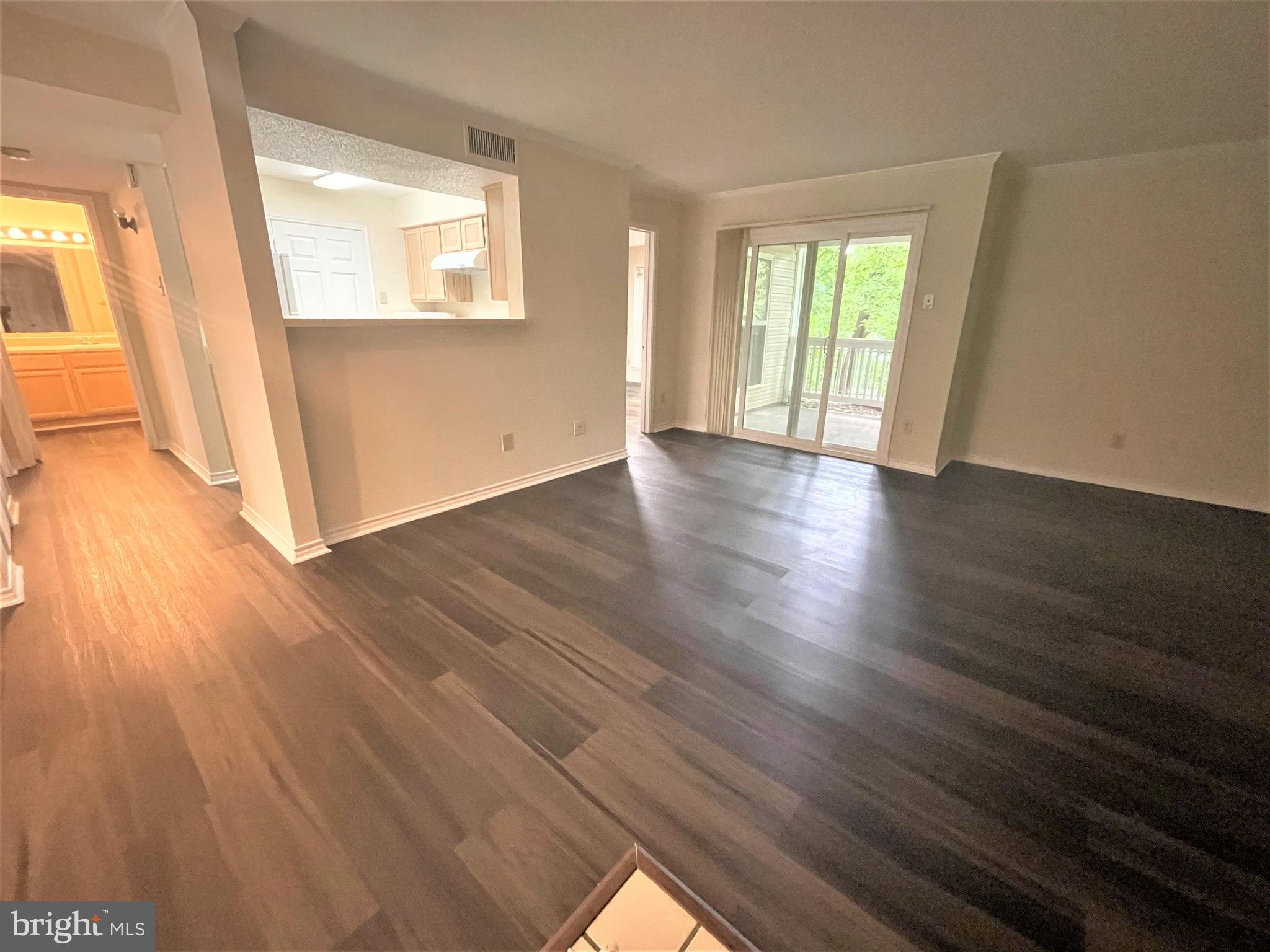 1505 Lincoln Way, Unit 101 McLean, VA 22102 - Photo 3 of 43 Spacious living room with new floor