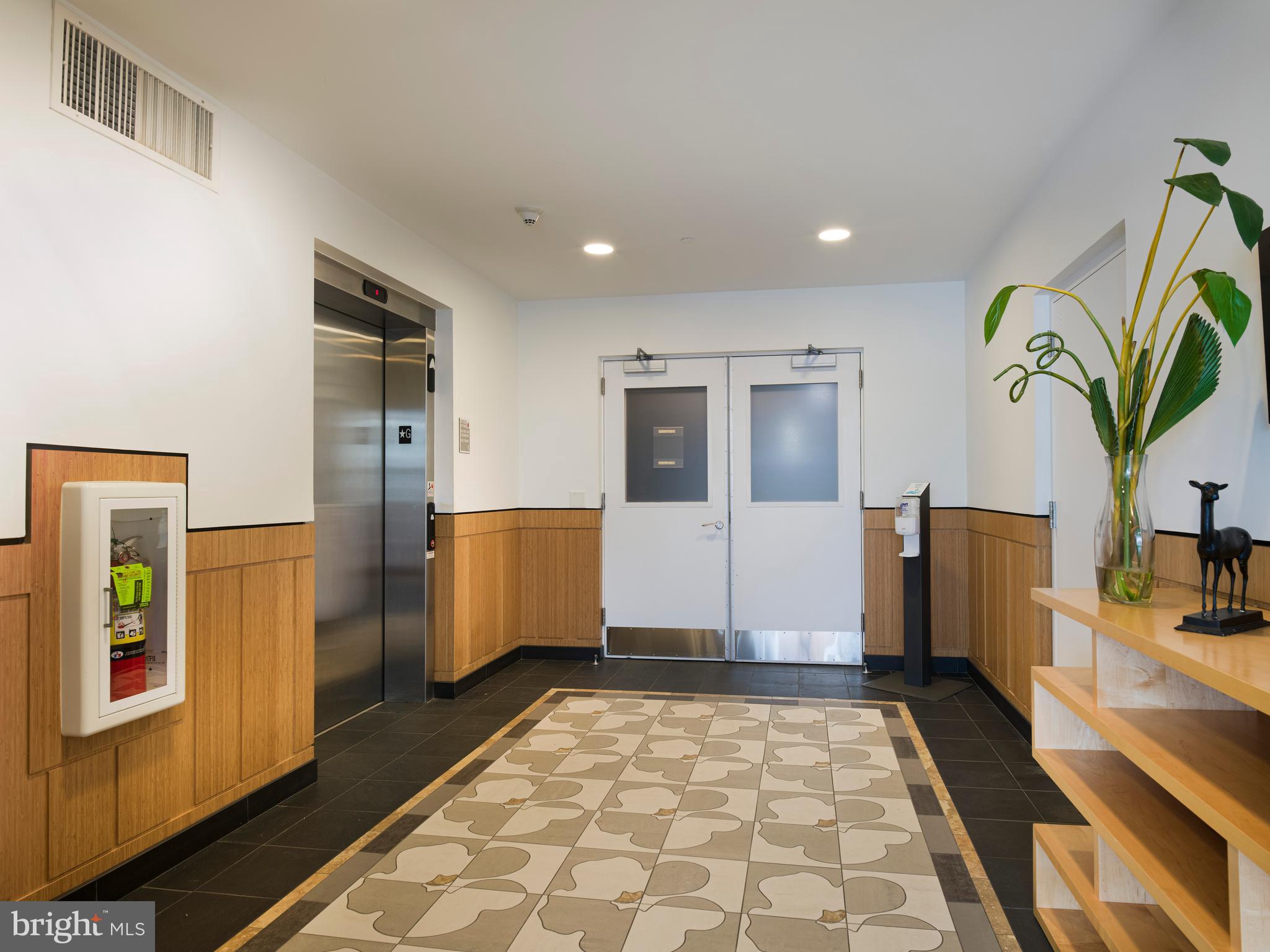 133 Iron Works Way, Unit A Wayne, PA 19087 - Photo 31 of 36 Doors into Parking Garage