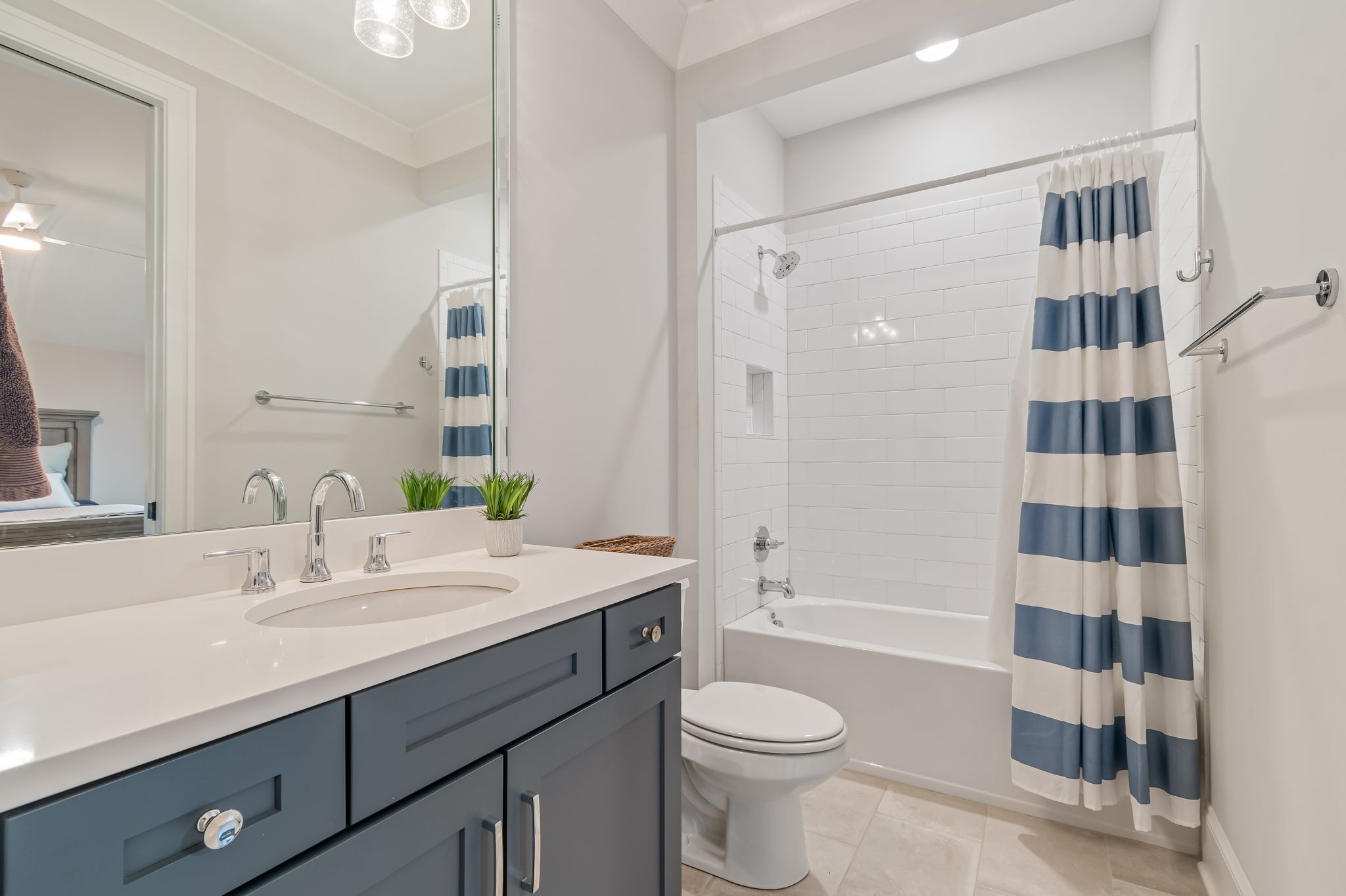 6304 Percheron Lane Arrington, TN 37014 - Photo 40 of 52 a bathroom with a sink a toilet a shower and a mirror