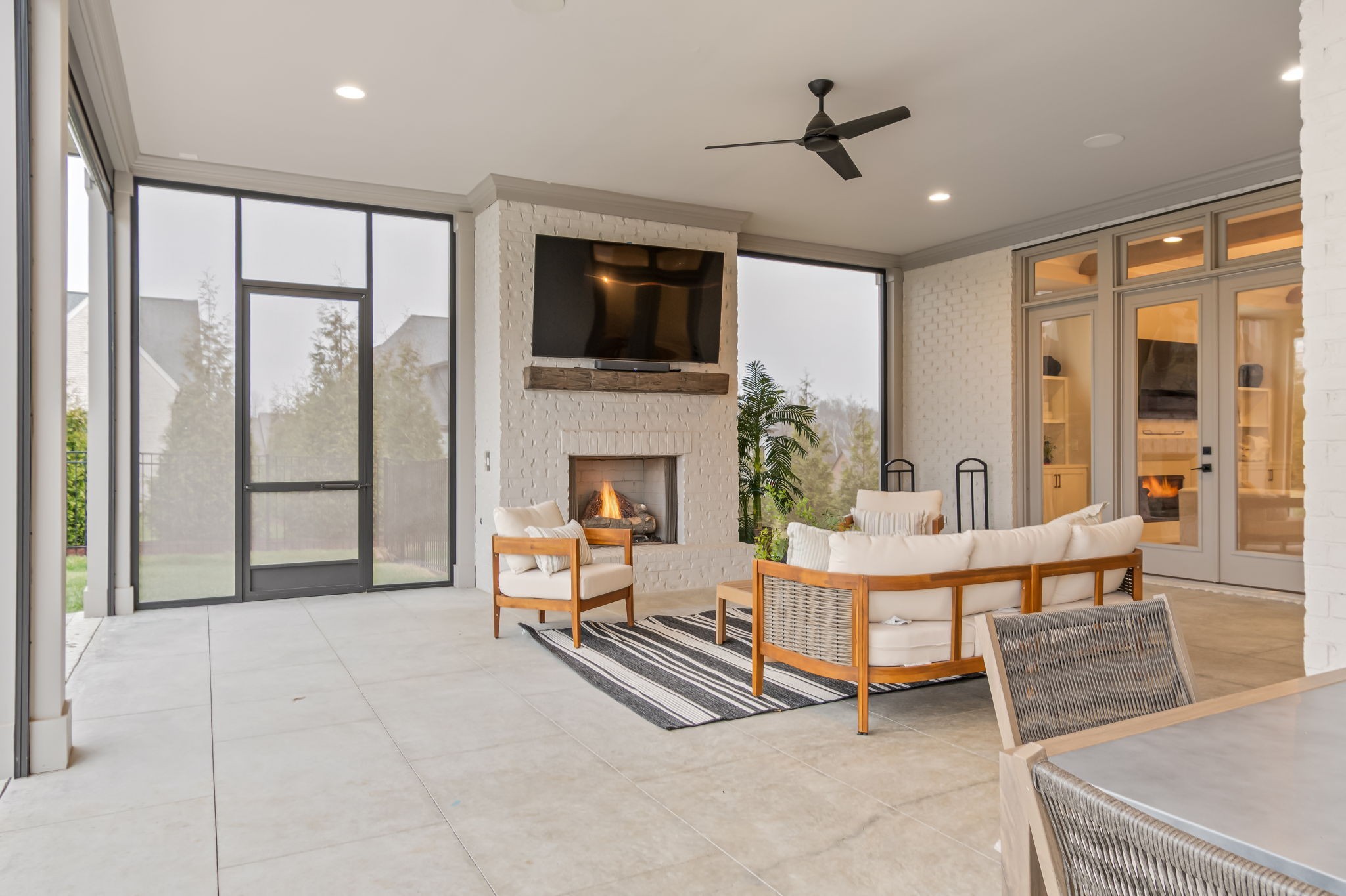 6304 Percheron Lane Arrington, TN 37014 - Photo 43 of 52 a living room with furniture a flat screen tv and a fireplace