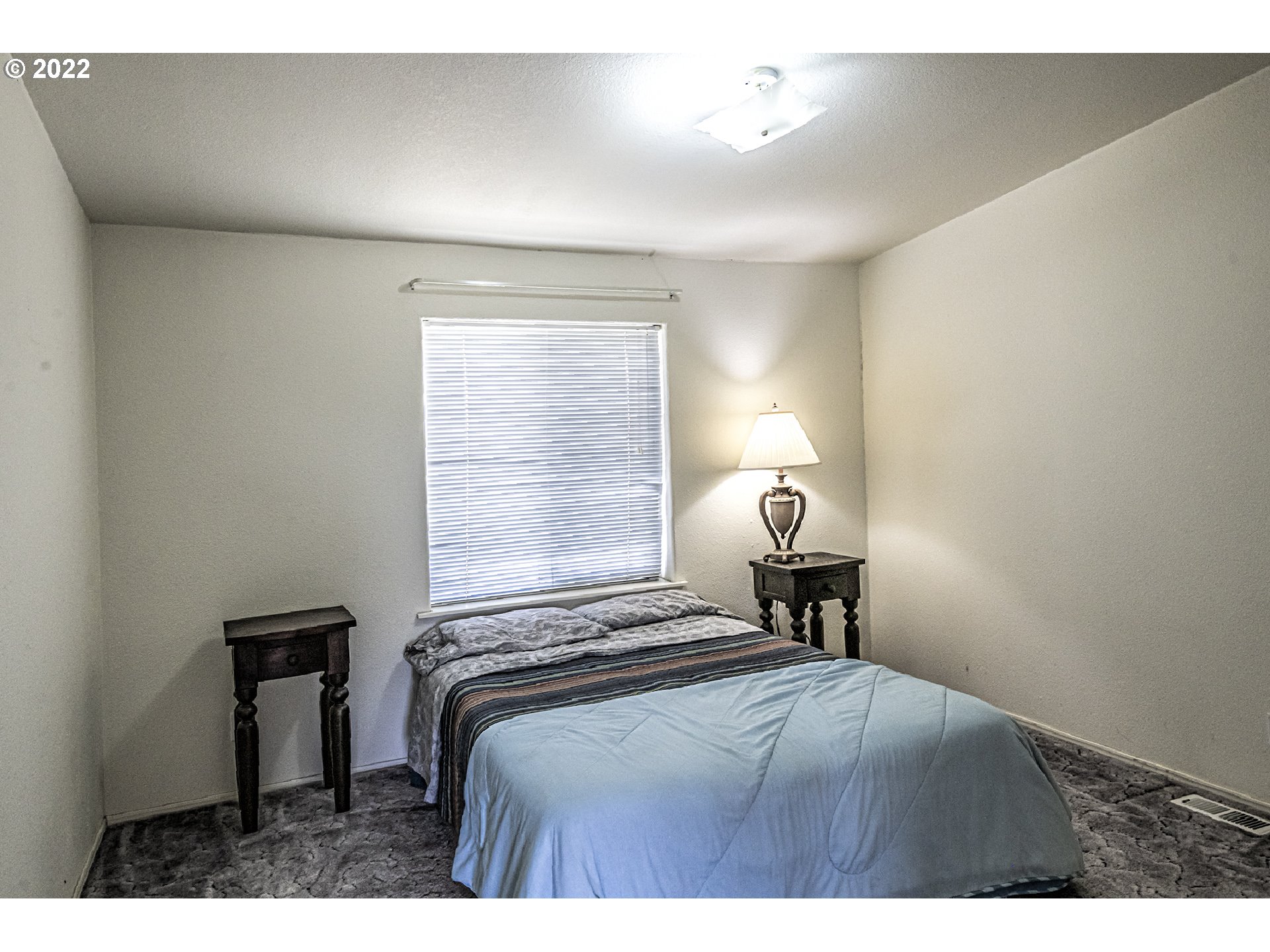 83007 County 643 Road Milton Freewater, OR 97862 - Photo 18 of 22 a bedroom with a bed and a window