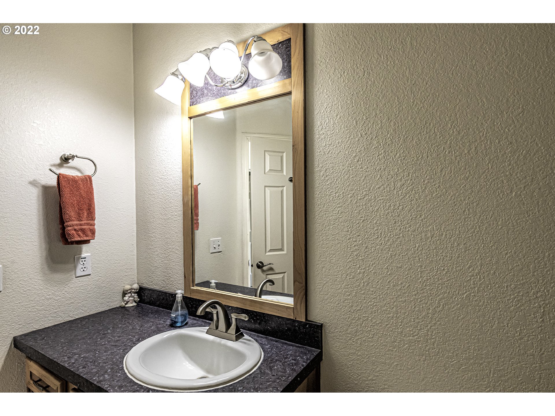 83007 County 643 Road Milton Freewater, OR 97862 - Photo 19 of 22 a bathroom with a sink and a mirror