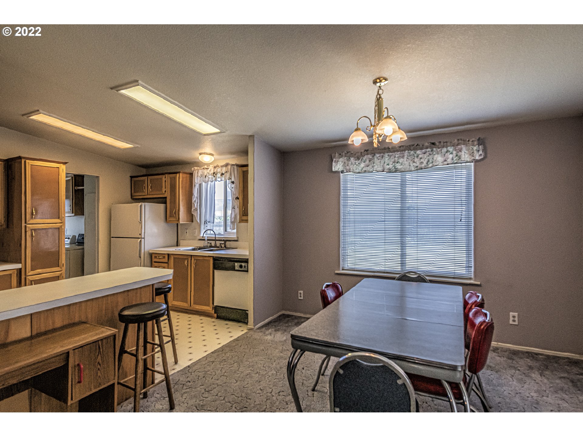 83007 County 643 Road Milton Freewater, OR 97862 - Photo 3 of 22 a dining room with a table chairs and entryway