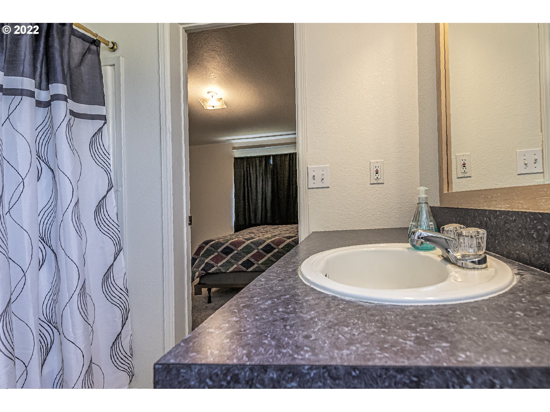 83007 County 643 Road Milton Freewater, OR 97862 - Photo 8 of 22 a bathroom with a sink and a mirror