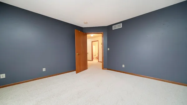 a view of a room with storage and utility room