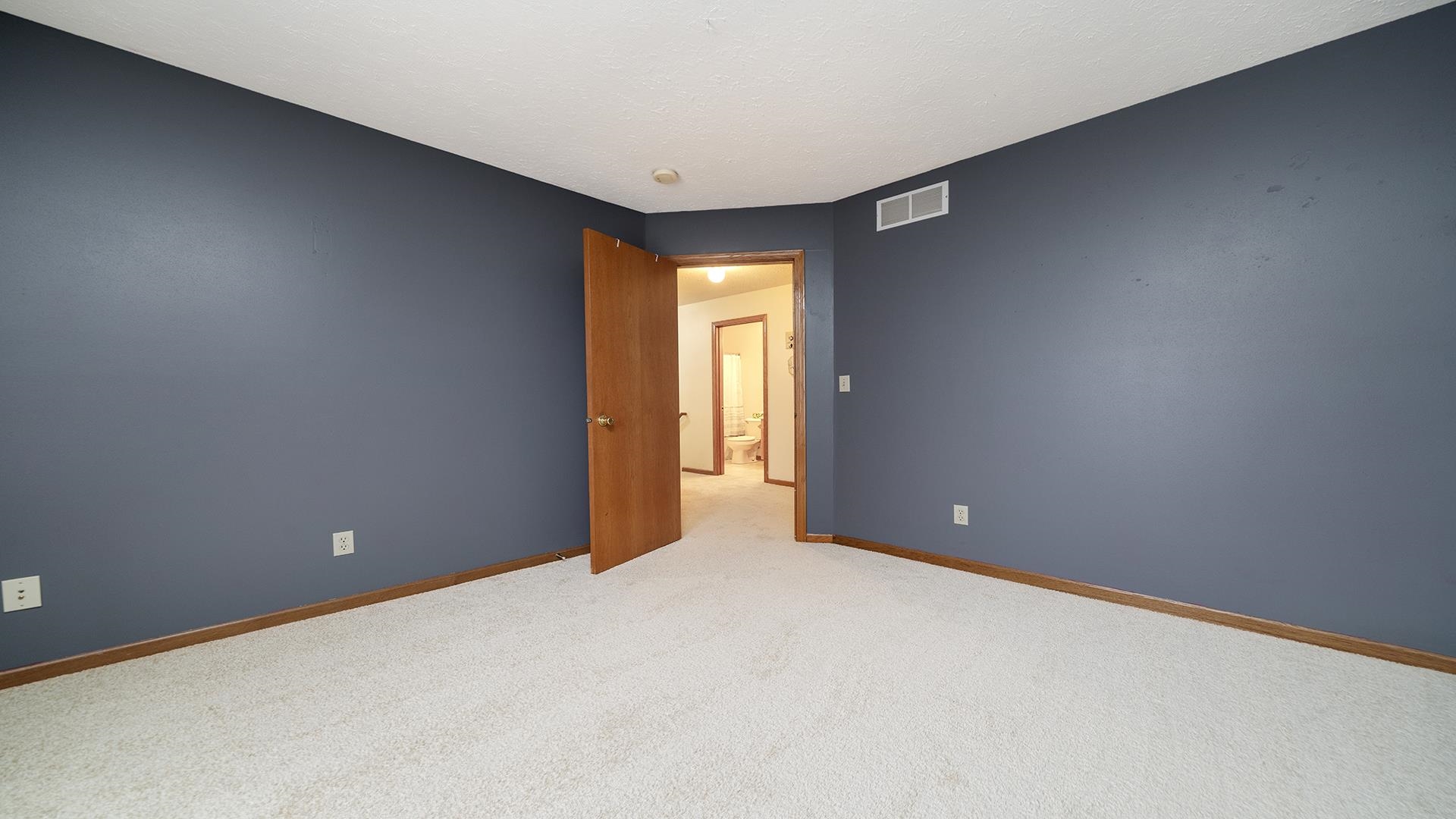 13116 Springhill Drive Winnebago, IL 61088 - Photo 22 of 50 a view of an empty room with a window