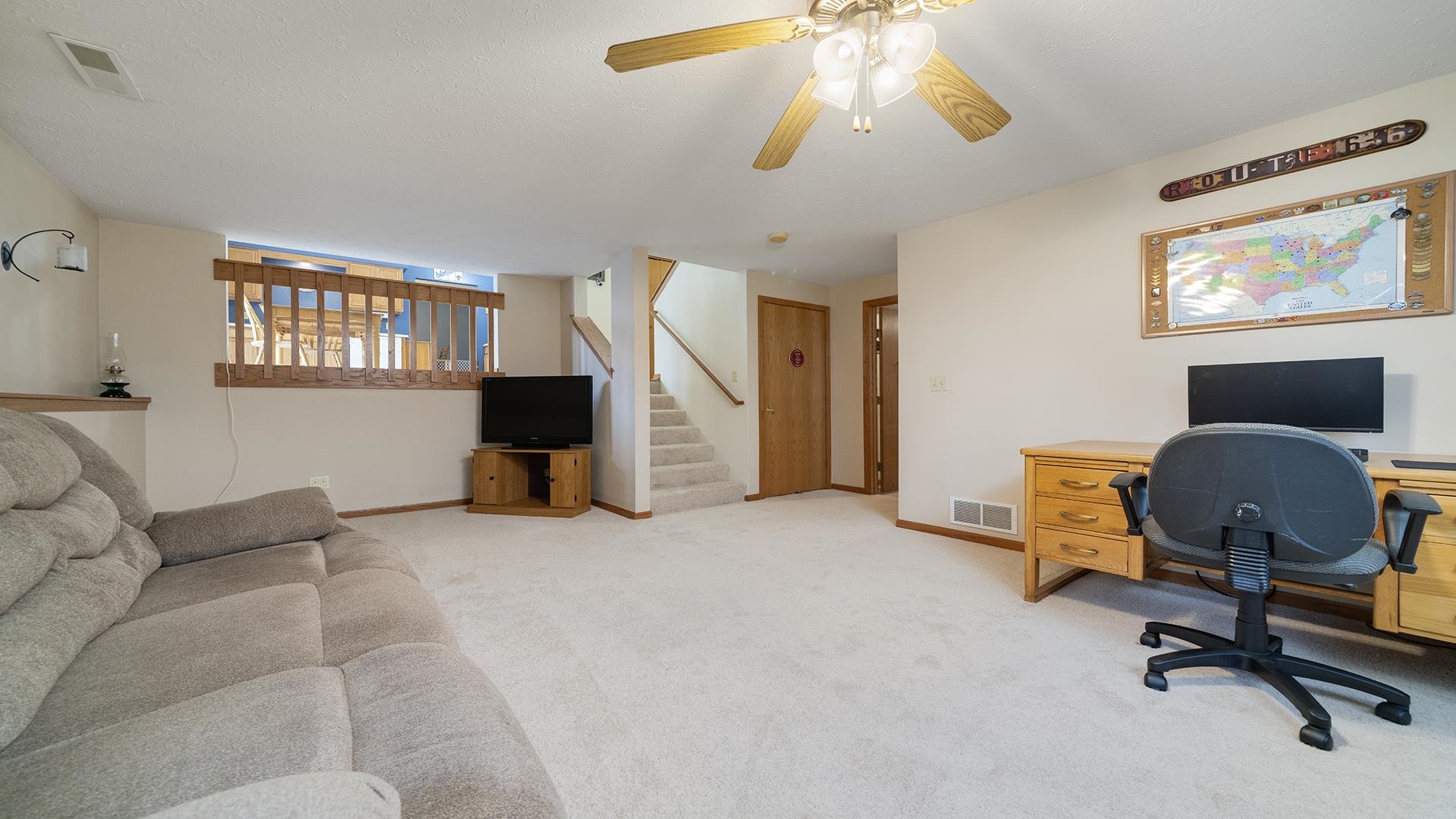 13116 Springhill Drive Winnebago, IL 61088 - Photo 27 of 50 a view of a livingroom with workspace and a window