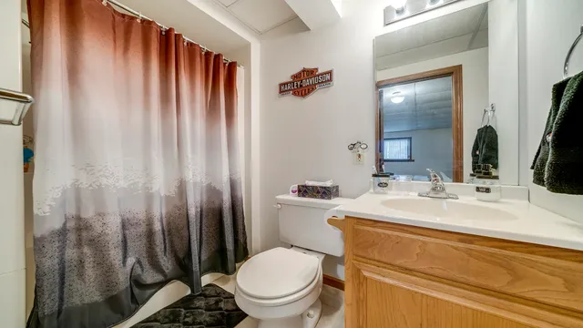 a view of a patio with couches chairs and potted plants