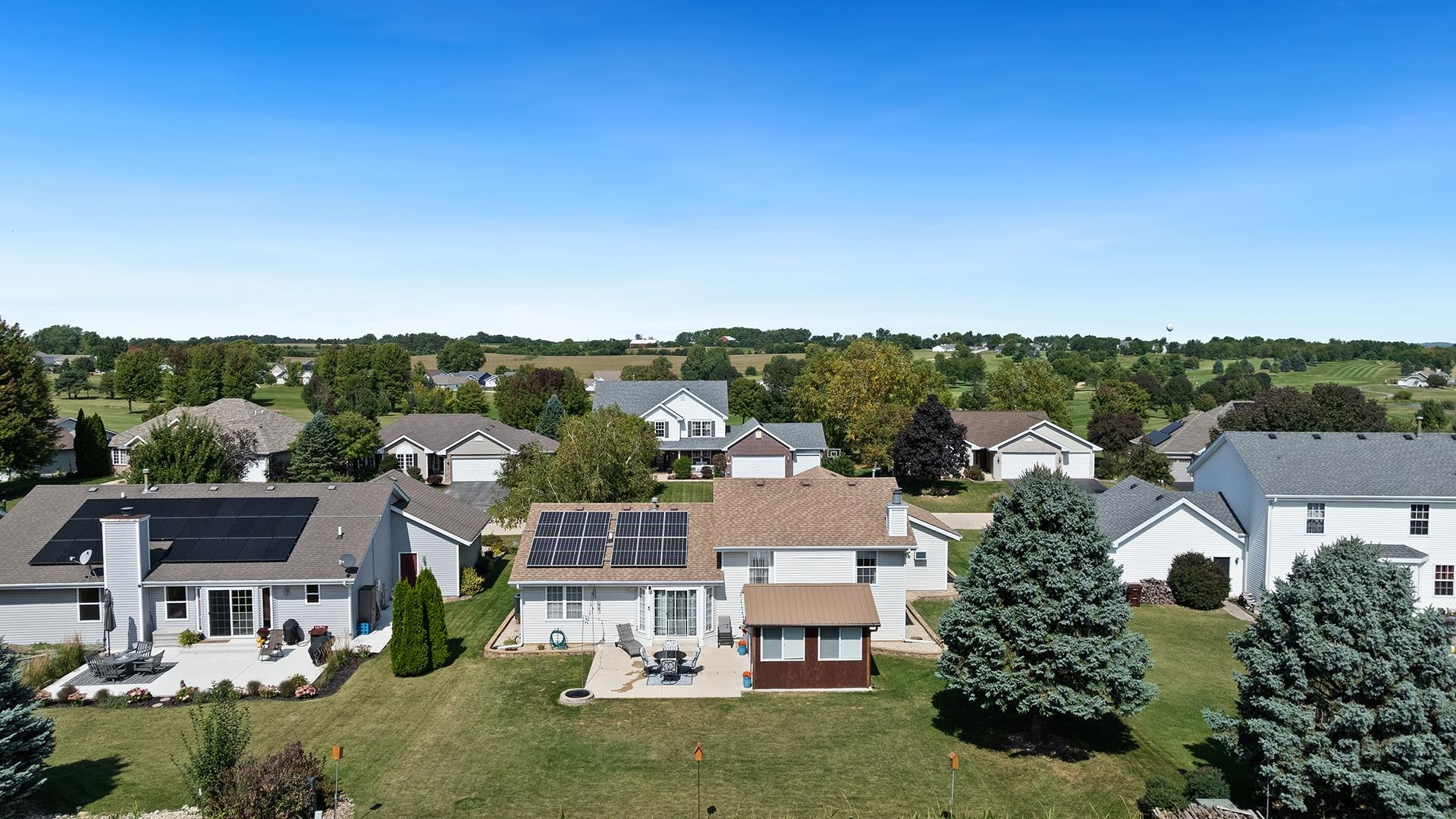 13116 Springhill Drive Winnebago, IL 61088 - Photo 42 of 50 an aerial view of residential houses with a city view