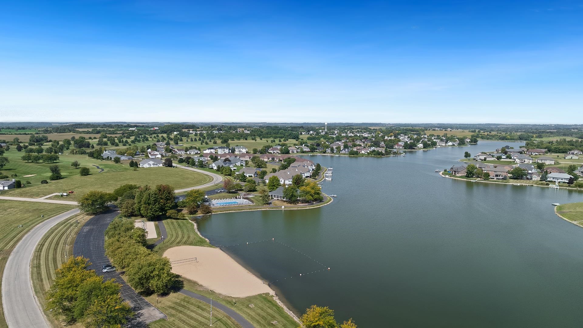 13116 Springhill Drive Winnebago, IL 61088 - Photo 46 of 50 a view of a lake with lawn chairs