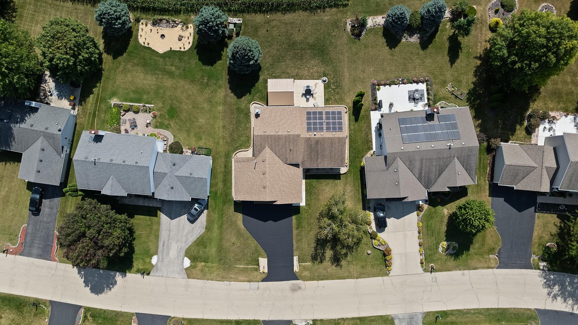 13116 Springhill Drive Winnebago, IL 61088 - Photo 5 of 50 an aerial view of residential houses with outdoor space and parking
