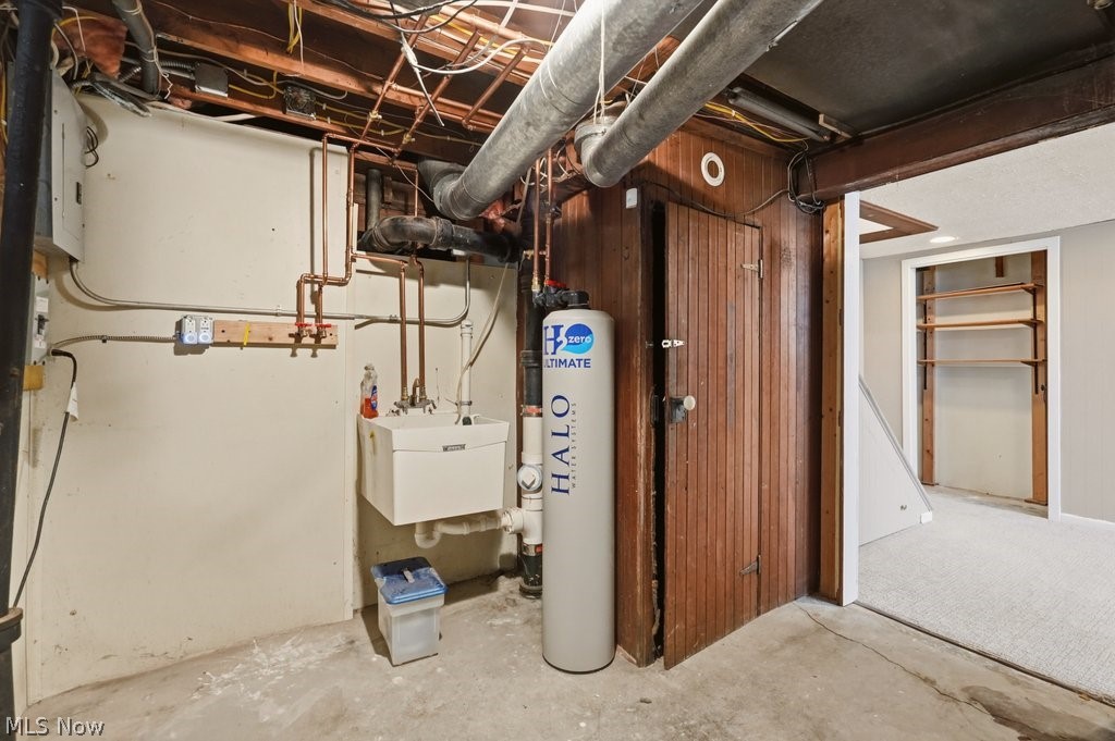 1379 Winston Road South Euclid, OH 44121 - Photo 24 of 30 Systems area with utility sink and whole house filtration system.