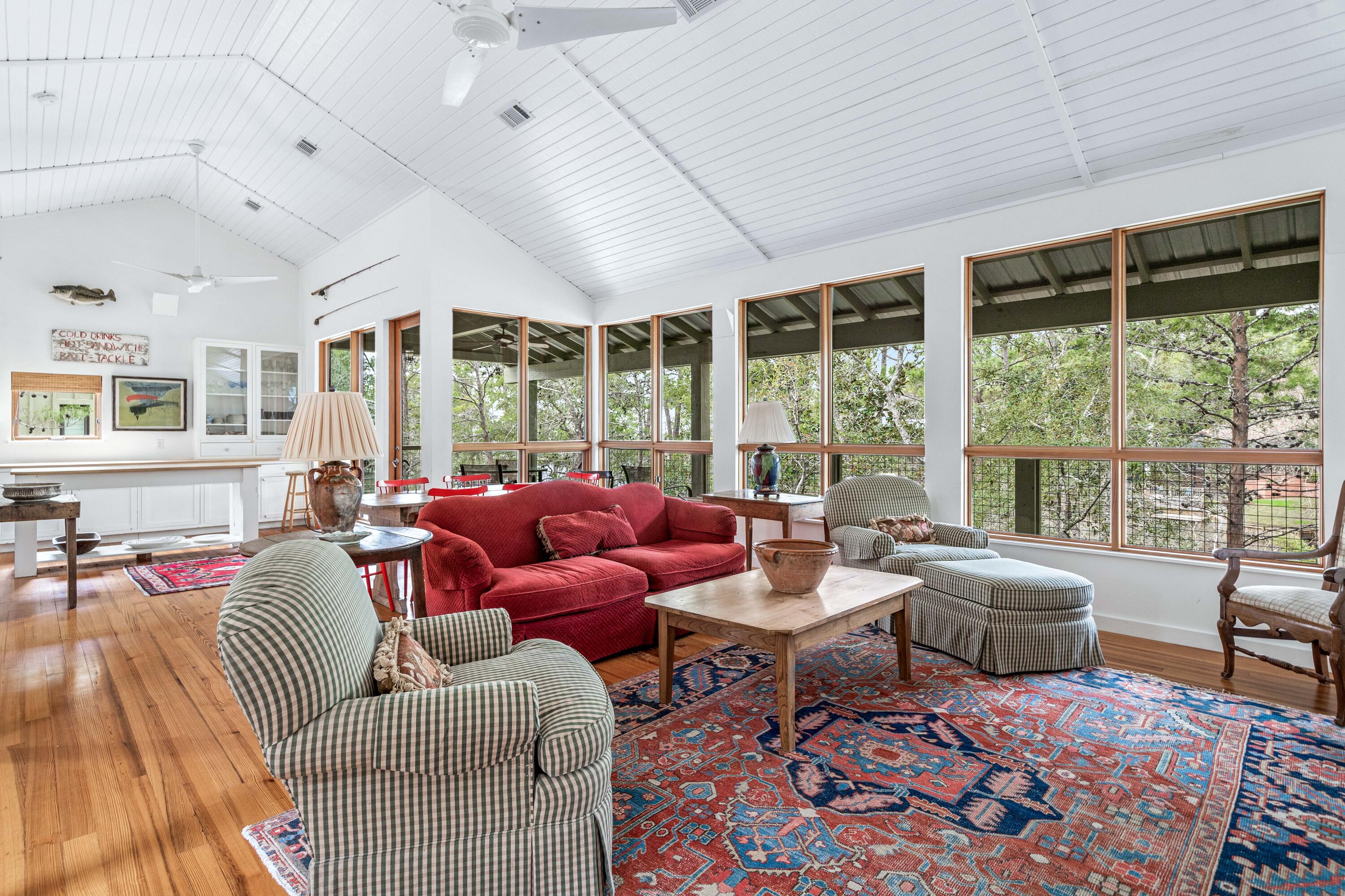 285 Wilderness Way Santa Rosa Beach, FL 32459 - Photo 32 of 69 a living room with furniture and a large window