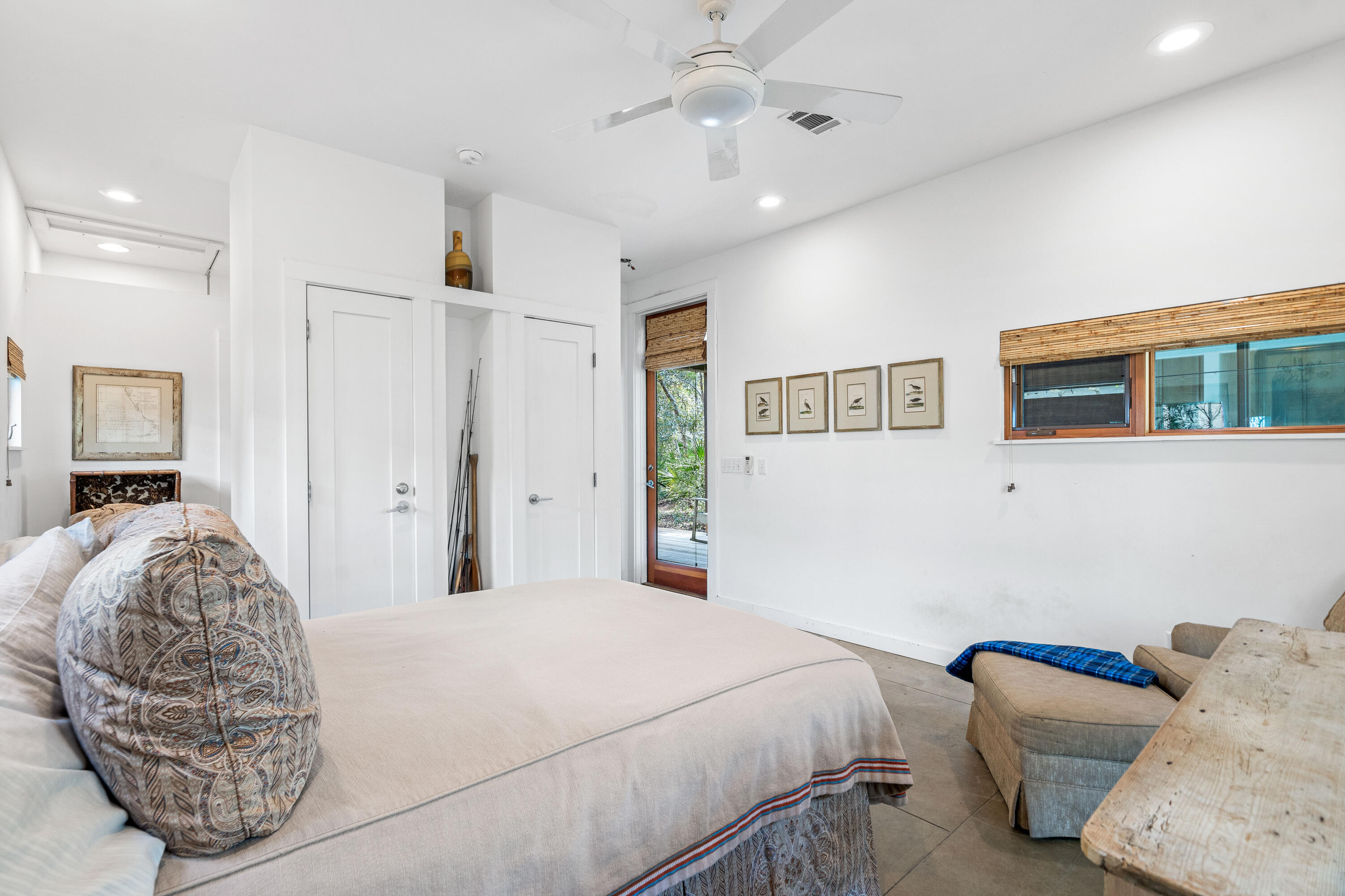 285 Wilderness Way Santa Rosa Beach, FL 32459 - Photo 52 of 69 a bedroom with a bed and a chandelier