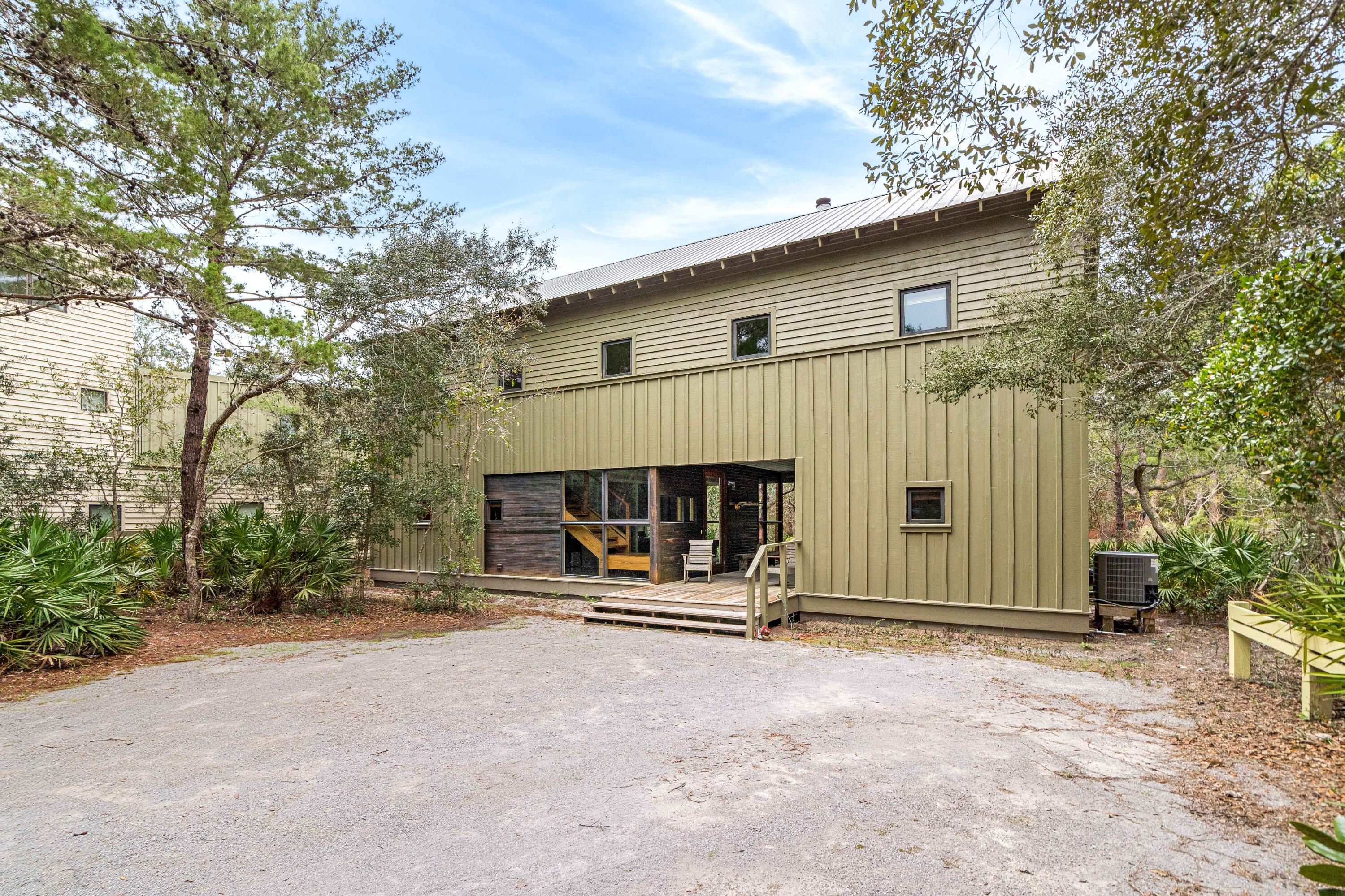 285 Wilderness Way Santa Rosa Beach, FL 32459 - Photo 8 of 69 a view of a house with backyard and sitting area