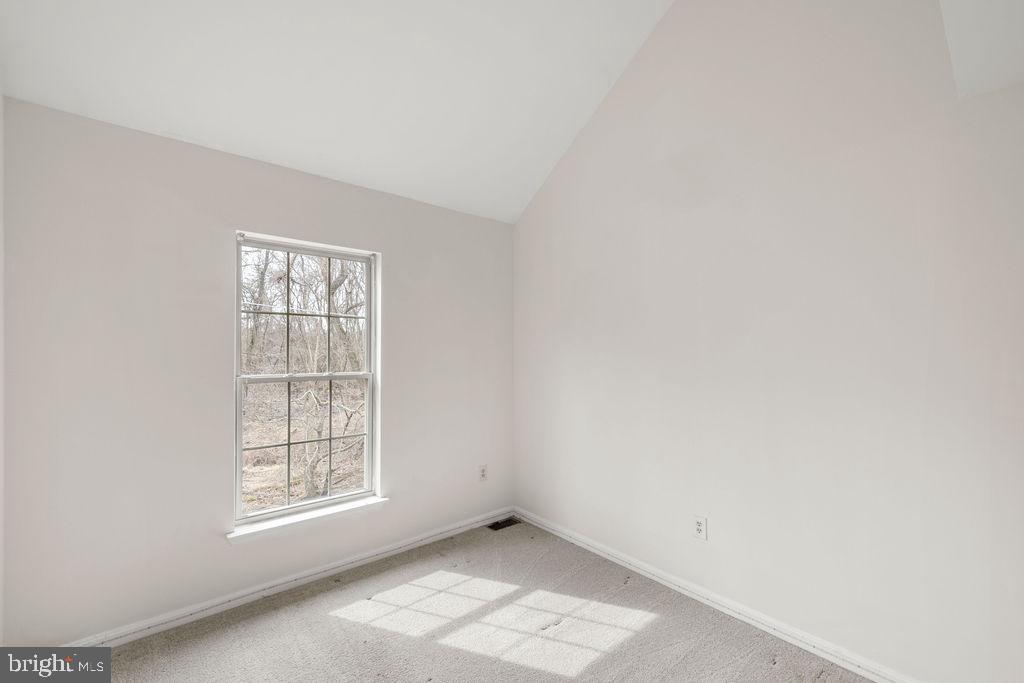 9823 Sherwood Farm Road Owings Mills, MD 21117 - Photo 21 of 29 an empty room with windows