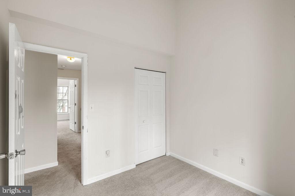 9823 Sherwood Farm Road Owings Mills, MD 21117 - Photo 24 of 29 an empty room with windows