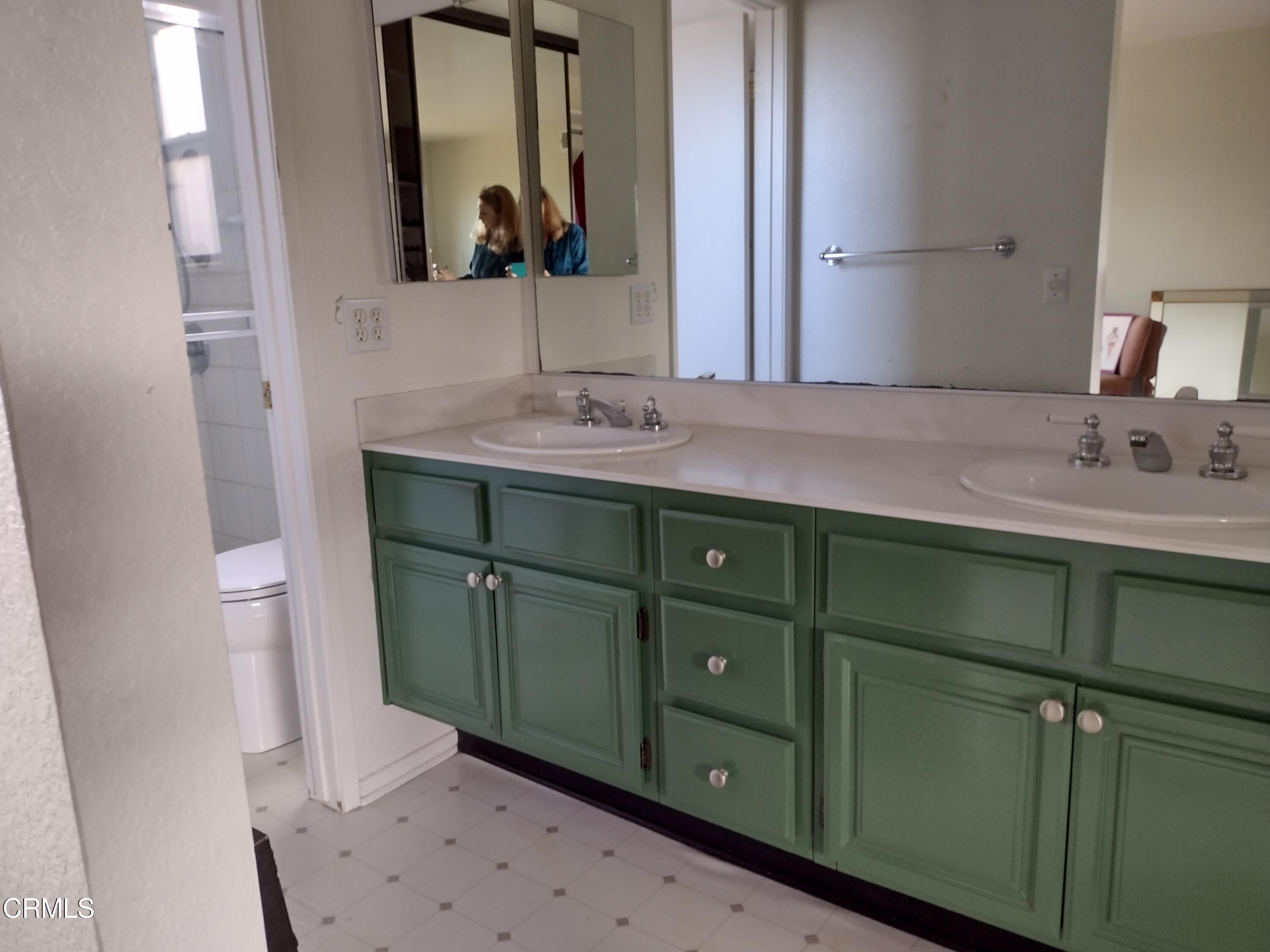 5928 Palomar Circle Camarillo, CA 93012 - Photo 18 of 33 a bathroom with a sink and a mirror