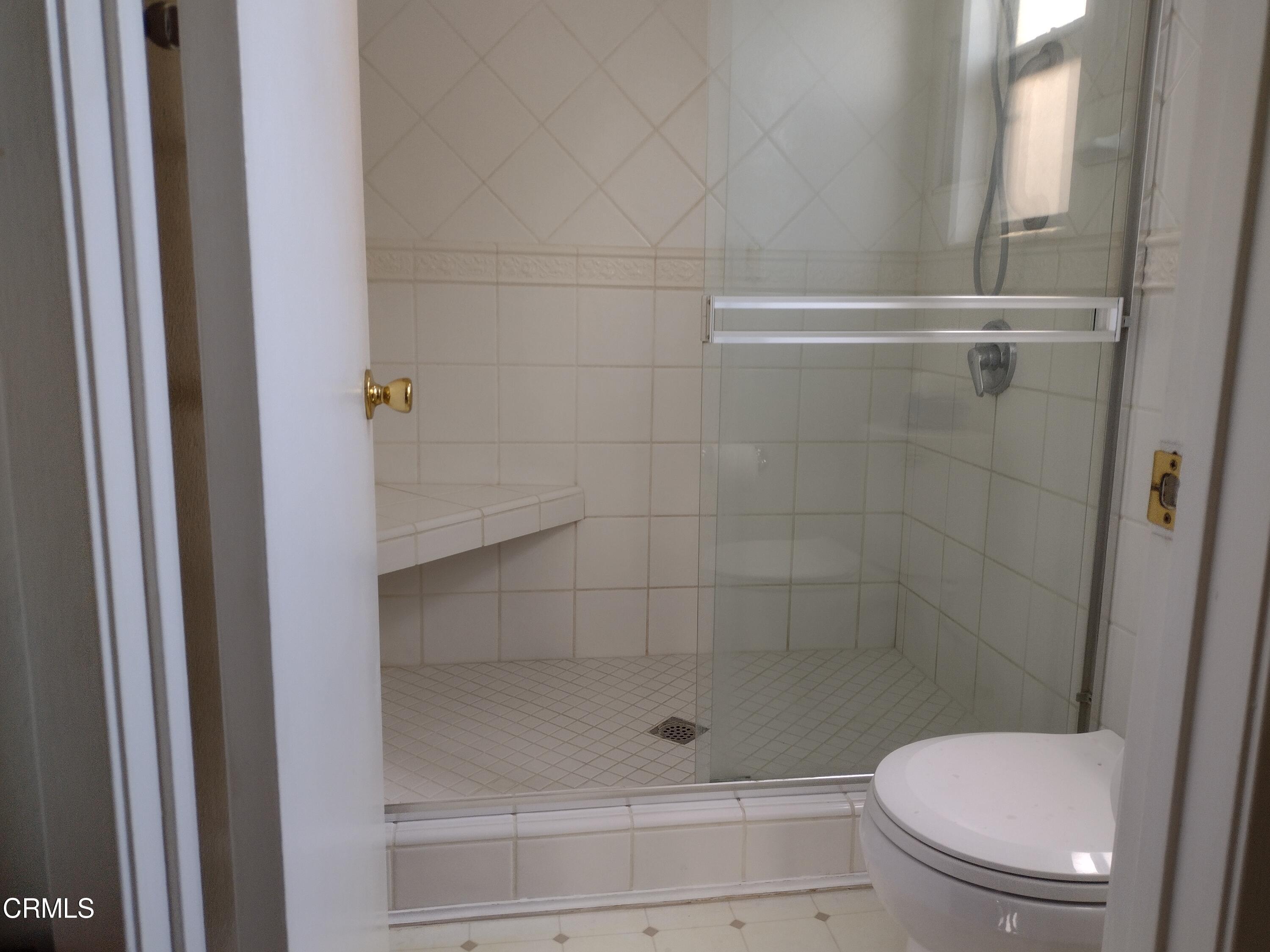 5928 Palomar Circle Camarillo, CA 93012 - Photo 19 of 33 a bathroom with a shower and toilet