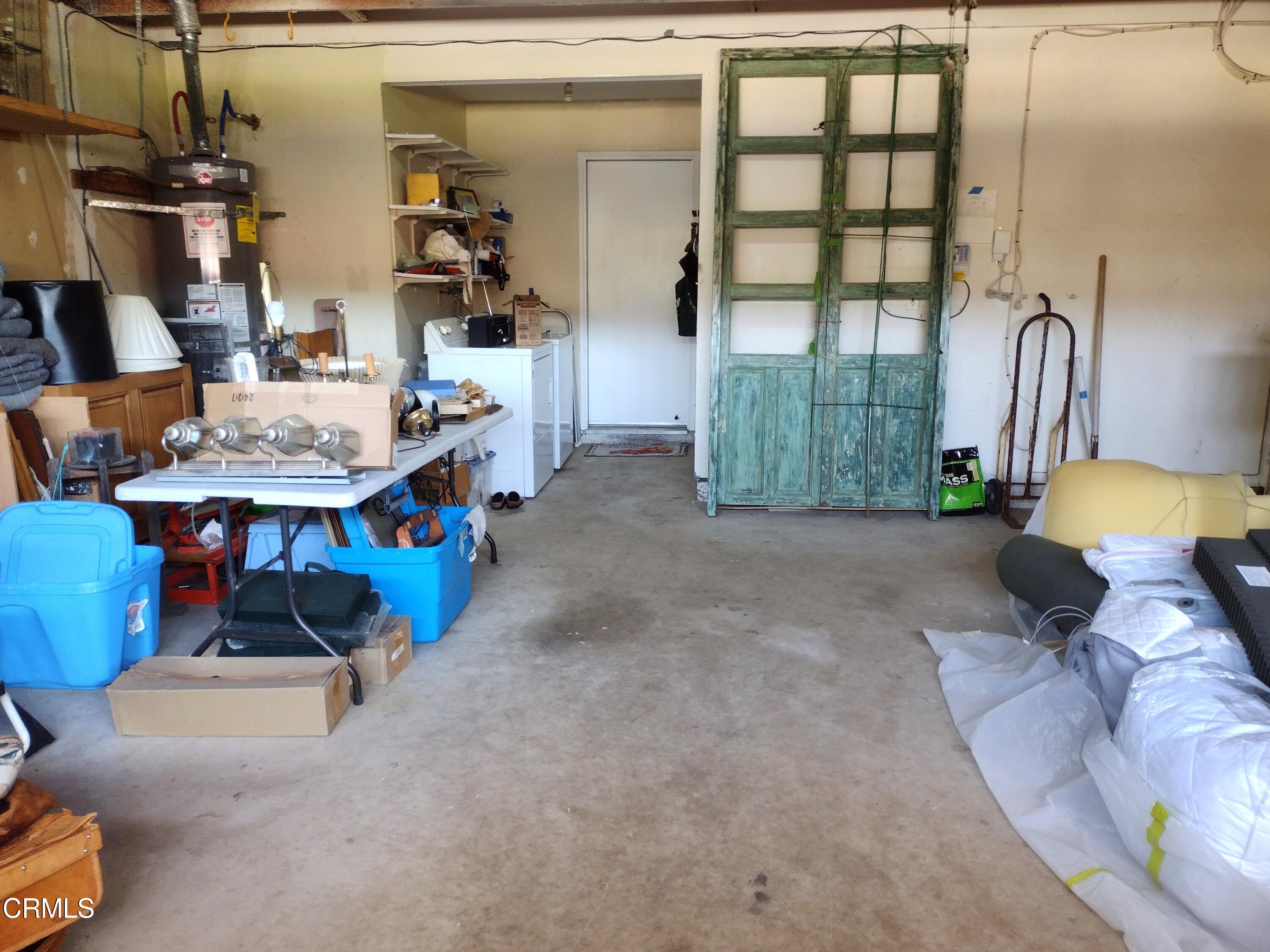 5928 Palomar Circle Camarillo, CA 93012 - Photo 26 of 33 a view of a room that has a couch and a potted plant on the table