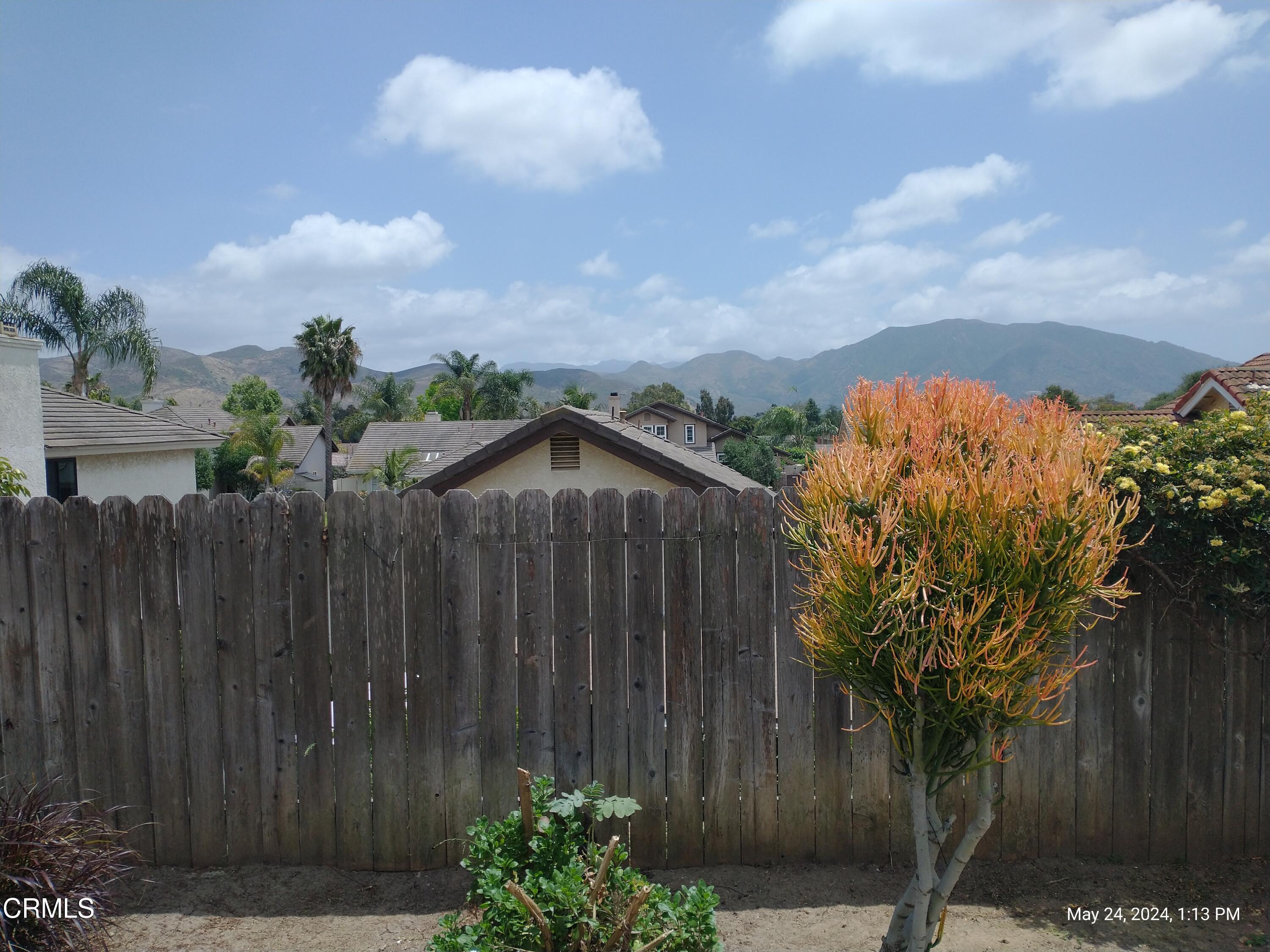 5928 Palomar Circle Camarillo, CA 93012 - Photo 29 of 33 a view of a wooden fence next to a house