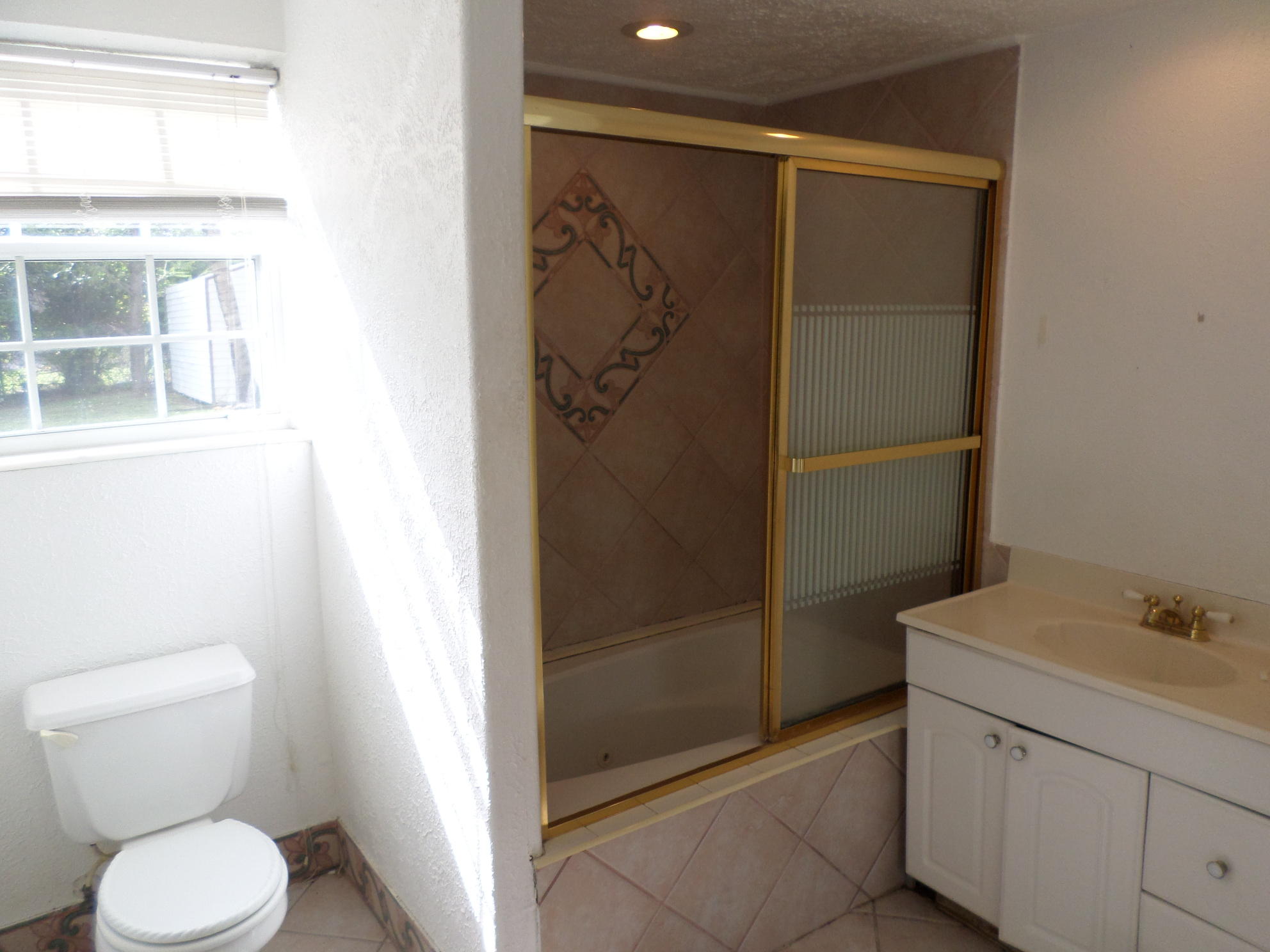 266 Akron Road Lake Worth, FL 33467 - Photo 8 of 14 Garage Bathroom.JPG