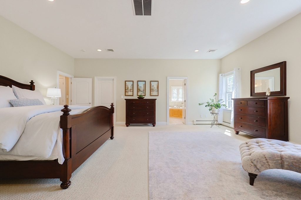 4 Berkeley Drive Walpole, MA 02081 - Photo 21 of 42 a bed room with furniture and wooden floor