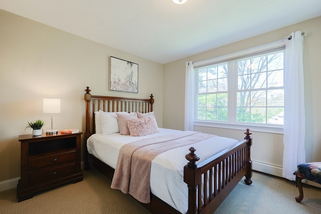 4 Berkeley Drive Walpole, MA 02081 - Photo 30 of 42 a bedroom with a bed and a window
