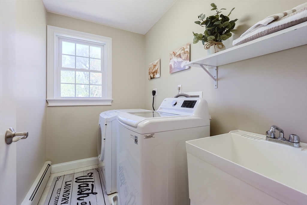 4 Berkeley Drive Walpole, MA 02081 - Photo 33 of 42 a utility room with dryer and washer