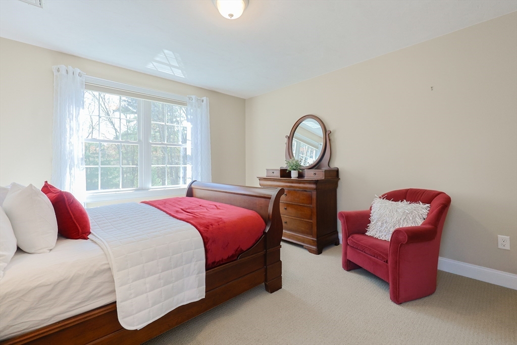 4 Berkeley Drive Walpole, MA 02081 - Photo 34 of 42 a bedroom with bed and a window