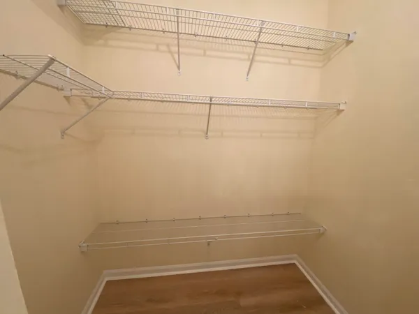 a view of a room with racks on the wall